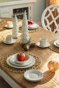 wood dining table with holiday decor